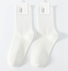 Chaussettes Femmes Décontracté Plain Toutes Les Saisons Coton Quotidien Chaussettes sur le mollet Régulier